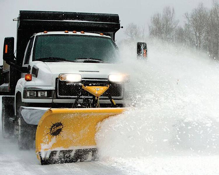 dump truck plowing snow